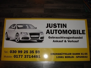 Justin Automobile Logo