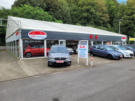 K + K Automobile Logo