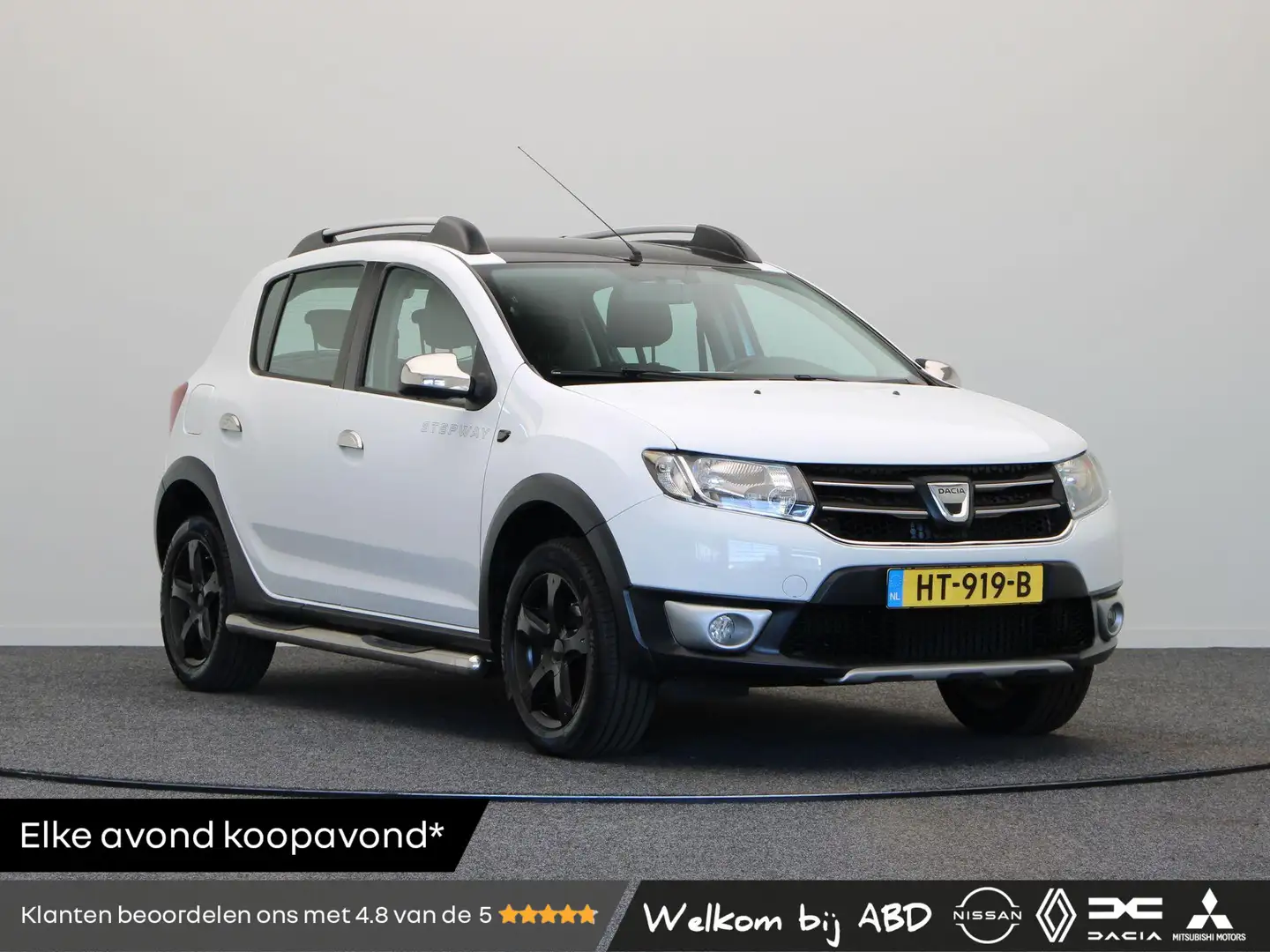Dacia Sandero 90pk TCe Stepway Lauréate | Trekhaak | Navigatie | Blanc - 1