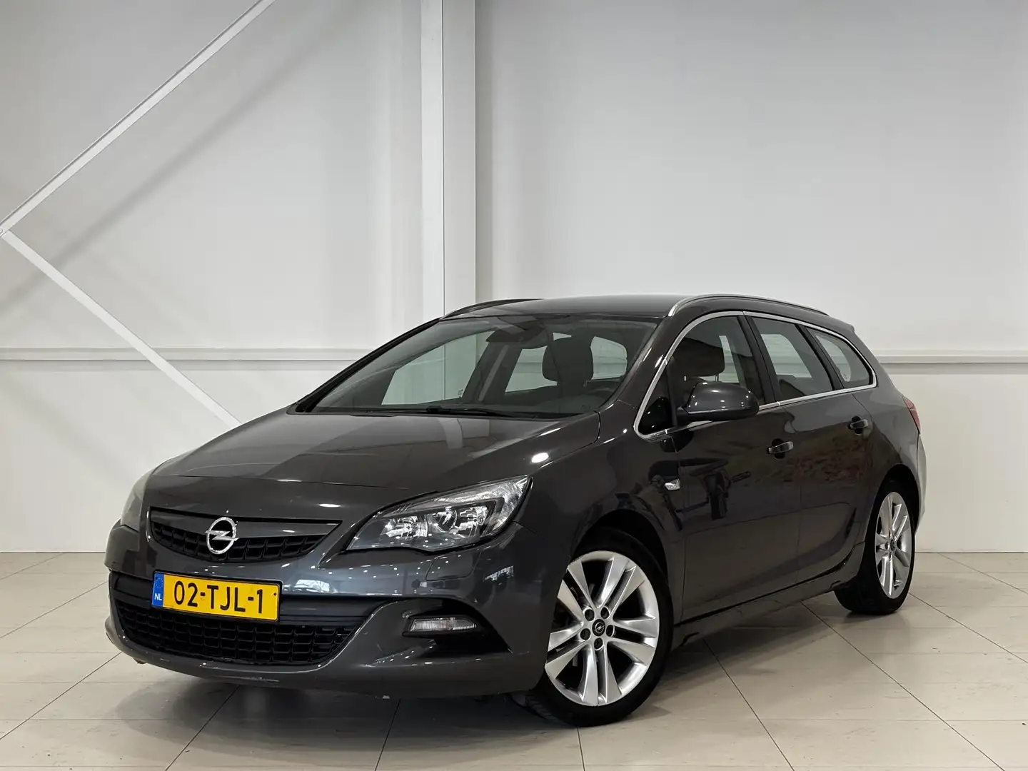 Opel Astra Sports Tourer 1.4 Turbo Sport | Climate Control | Grijs - 1