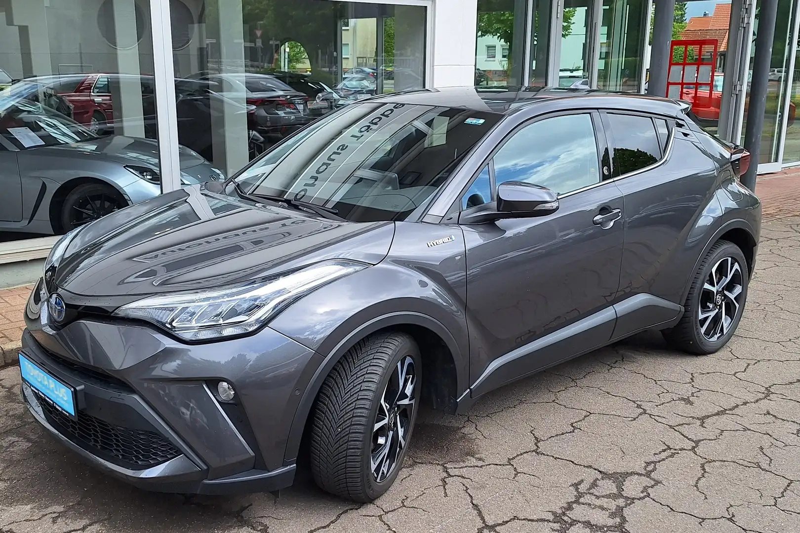 Toyota C-HR Hybrid Team D + Ganzjahresreifen + Garantie + + + Gris - 2