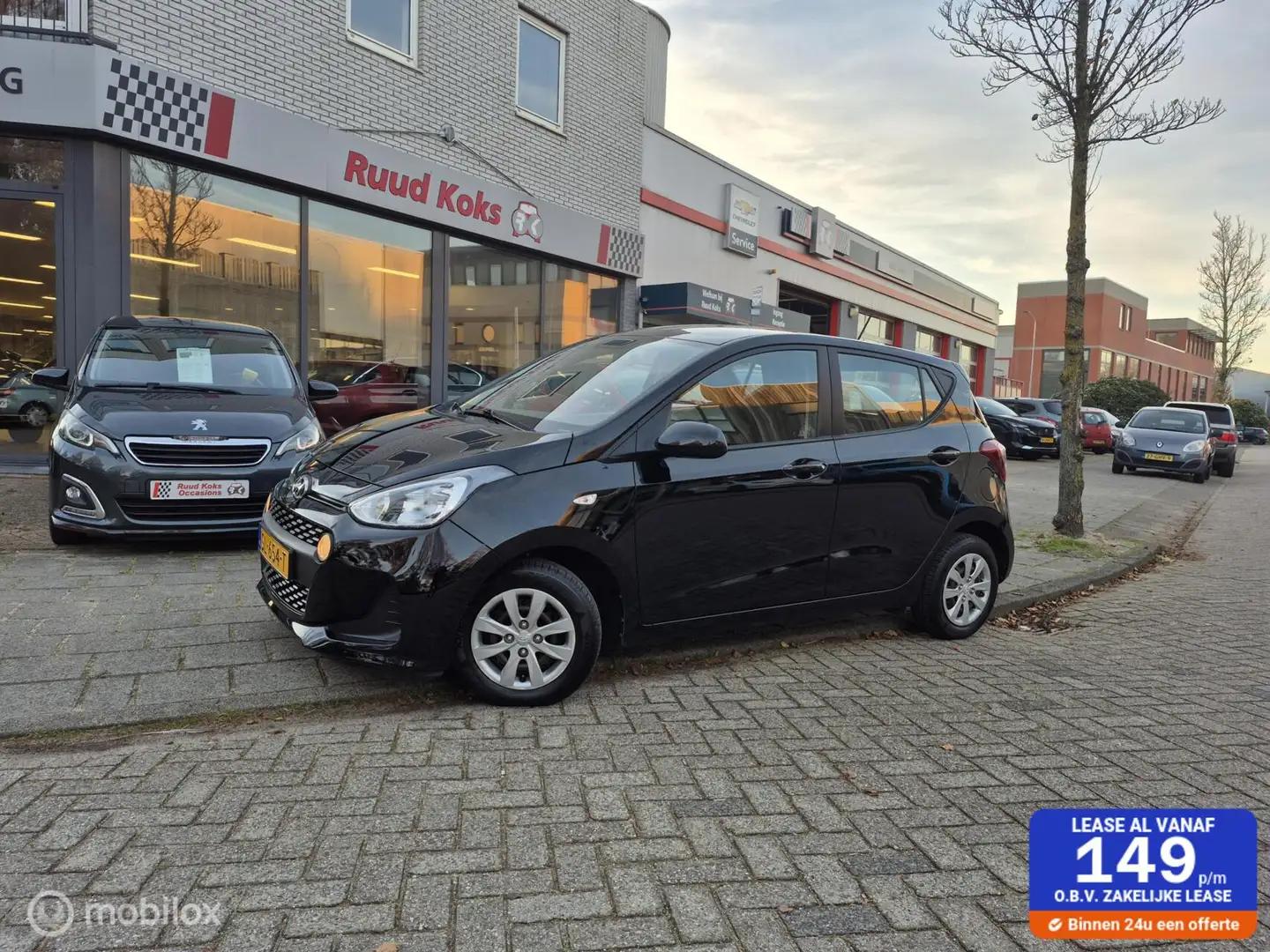 Hyundai i10 1.0i COMFORT / 1e Eigenaar / Carplay / Schwarz - 1