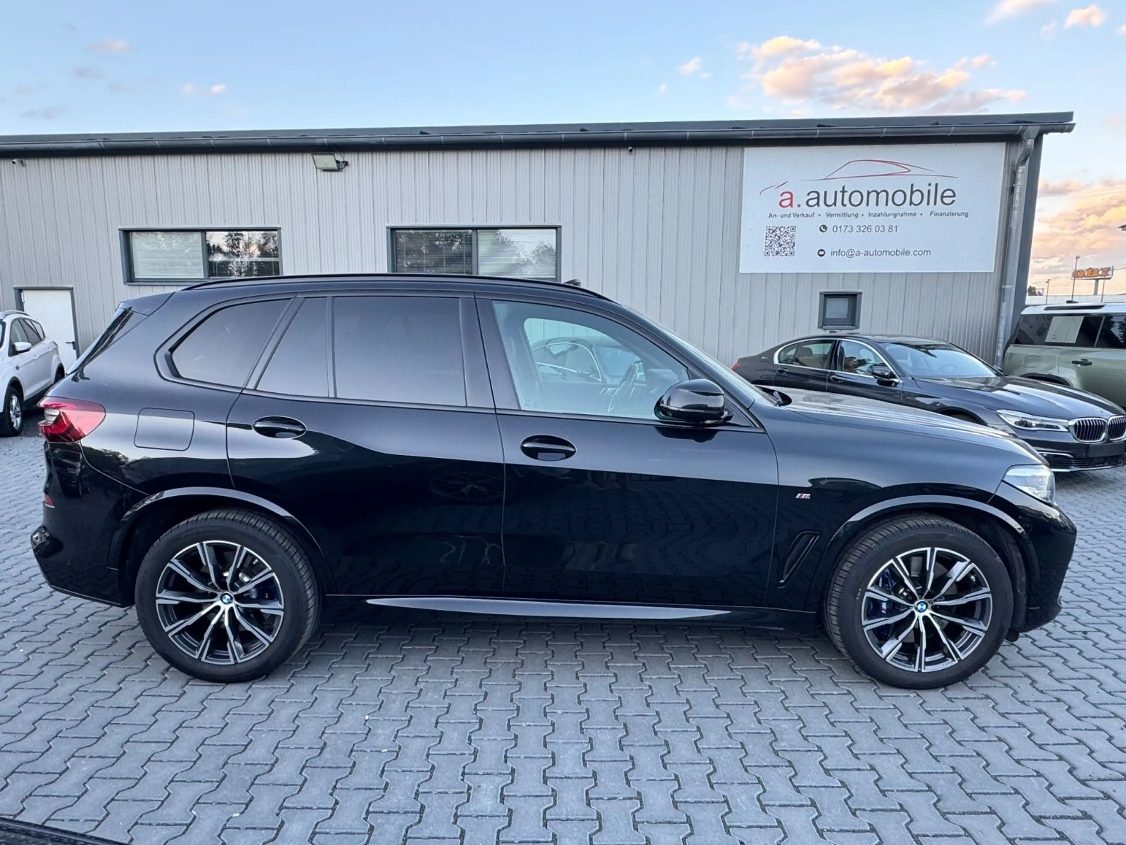 BMW X5 xDrive 45 e M Sport — photo 11