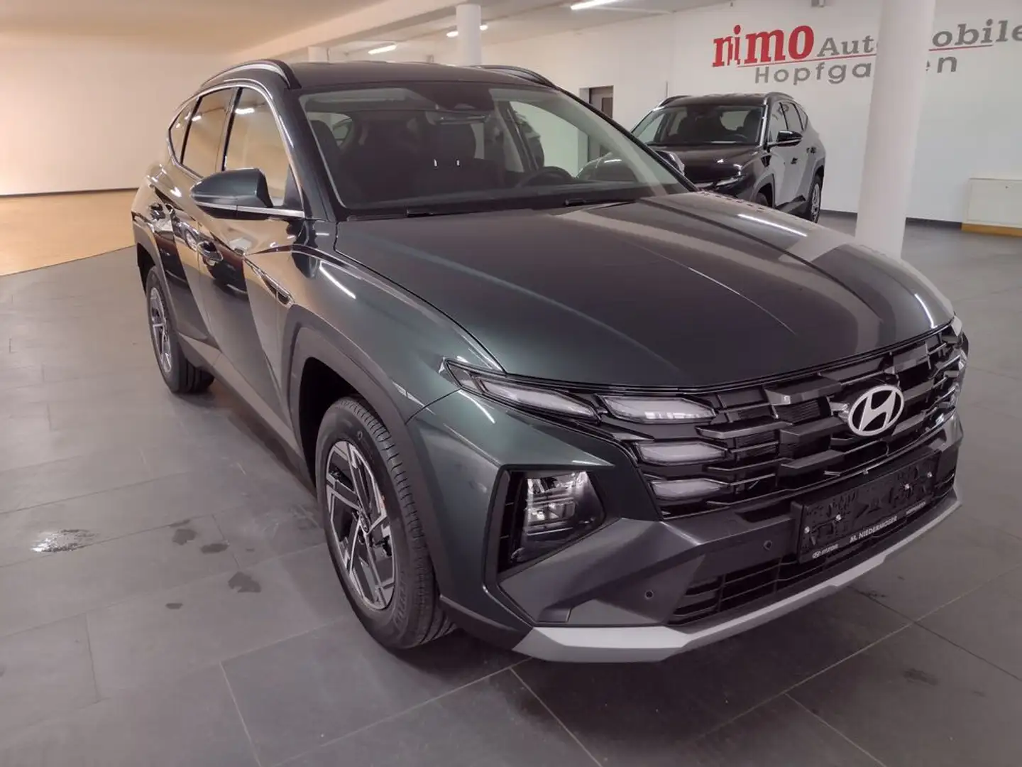Hyundai TUCSON 1,6 T-GDI HEV 2WD Jubilé Aut. Grün - 1