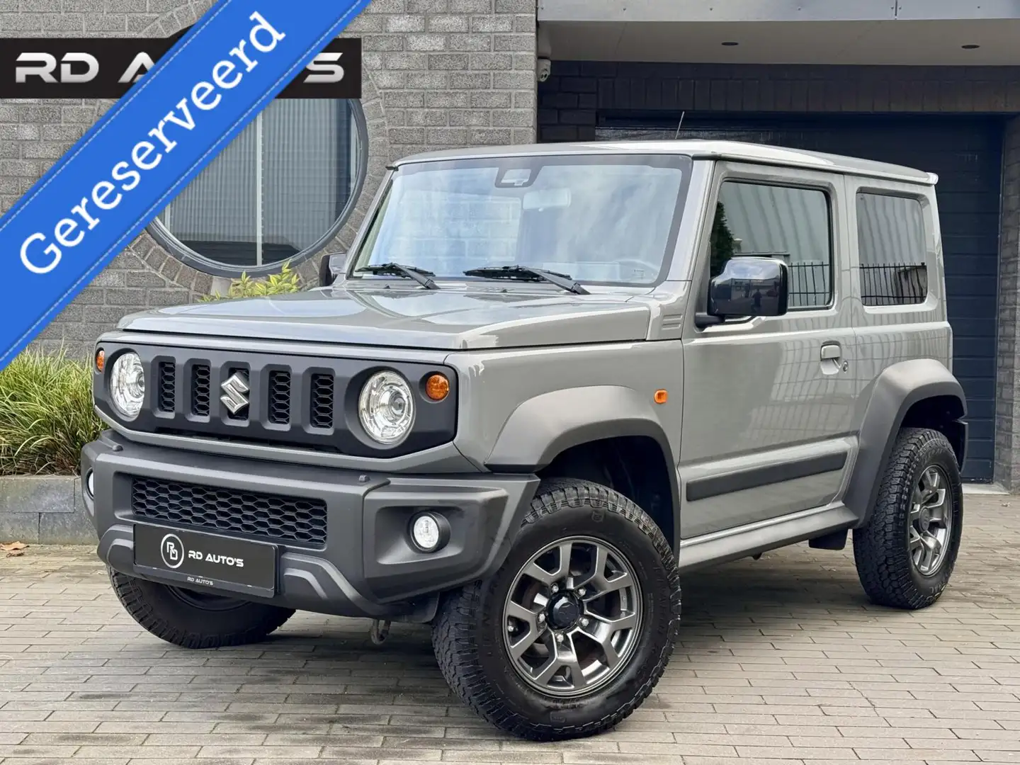 Suzuki Jimny 1.5 Stijl All Grip 4Pers Led Navi Clima Grijs - 1
