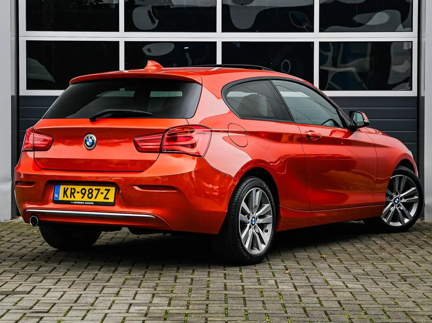 BMW 116 1-serie 116d High Executive | Automaat | Schuifdak Oranje - 2