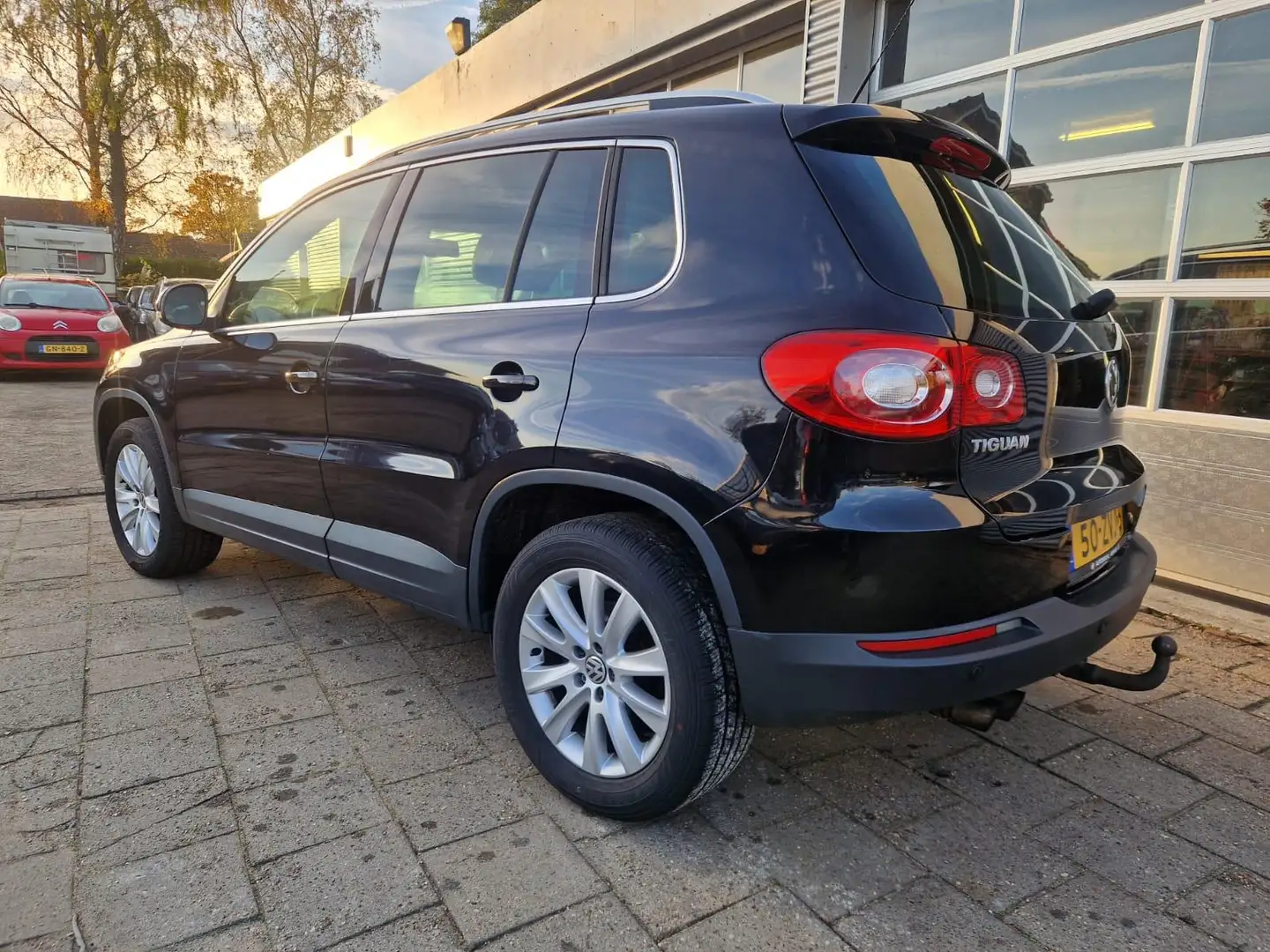 Volkswagen Tiguan 1.4 TSI Sport&Style 4Motion ( EXPORTPRIJS) Zwart - 2