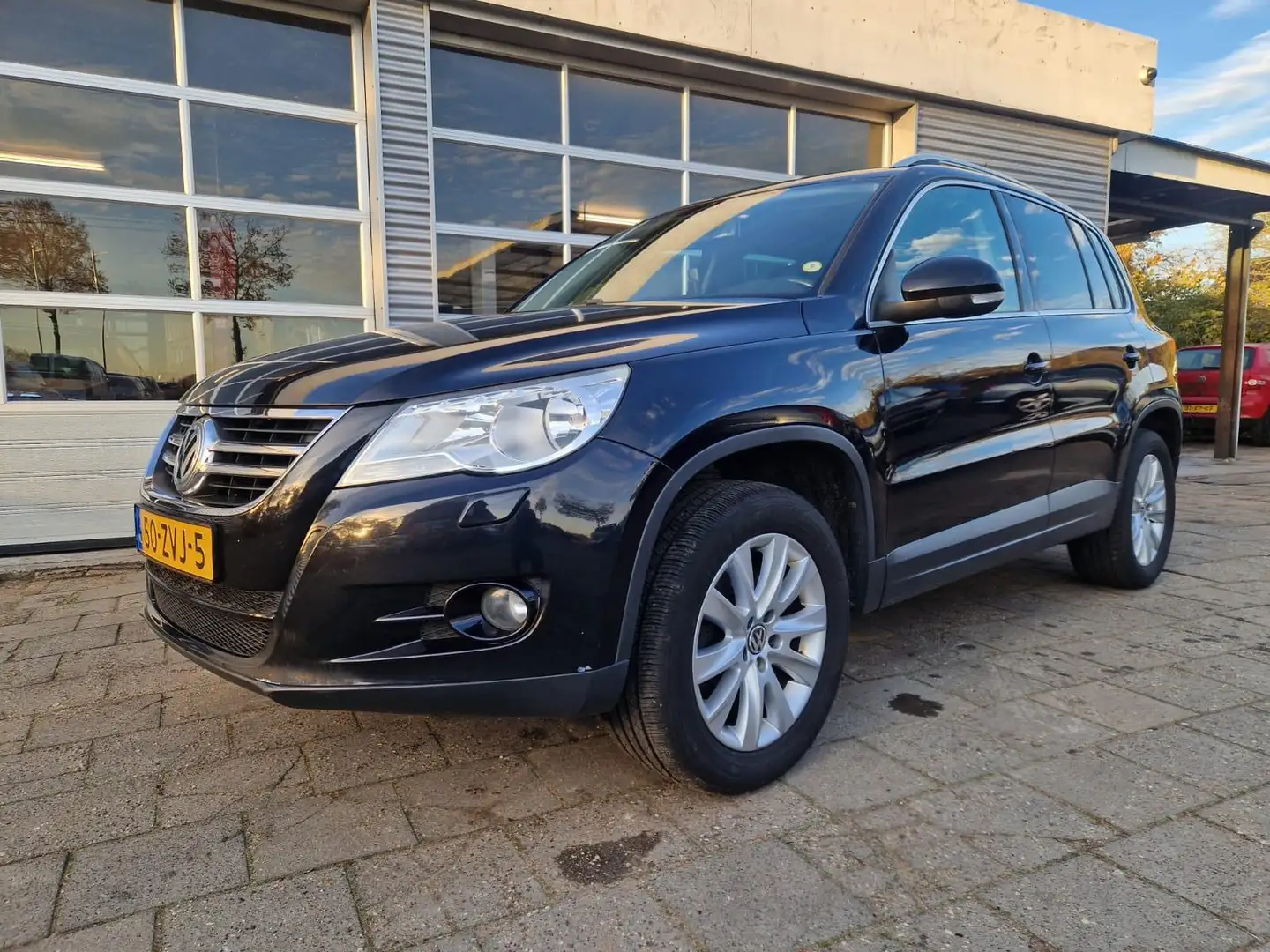 Volkswagen Tiguan 1.4 TSI Sport&Style 4Motion ( EXPORTPRIJS) Zwart - 1