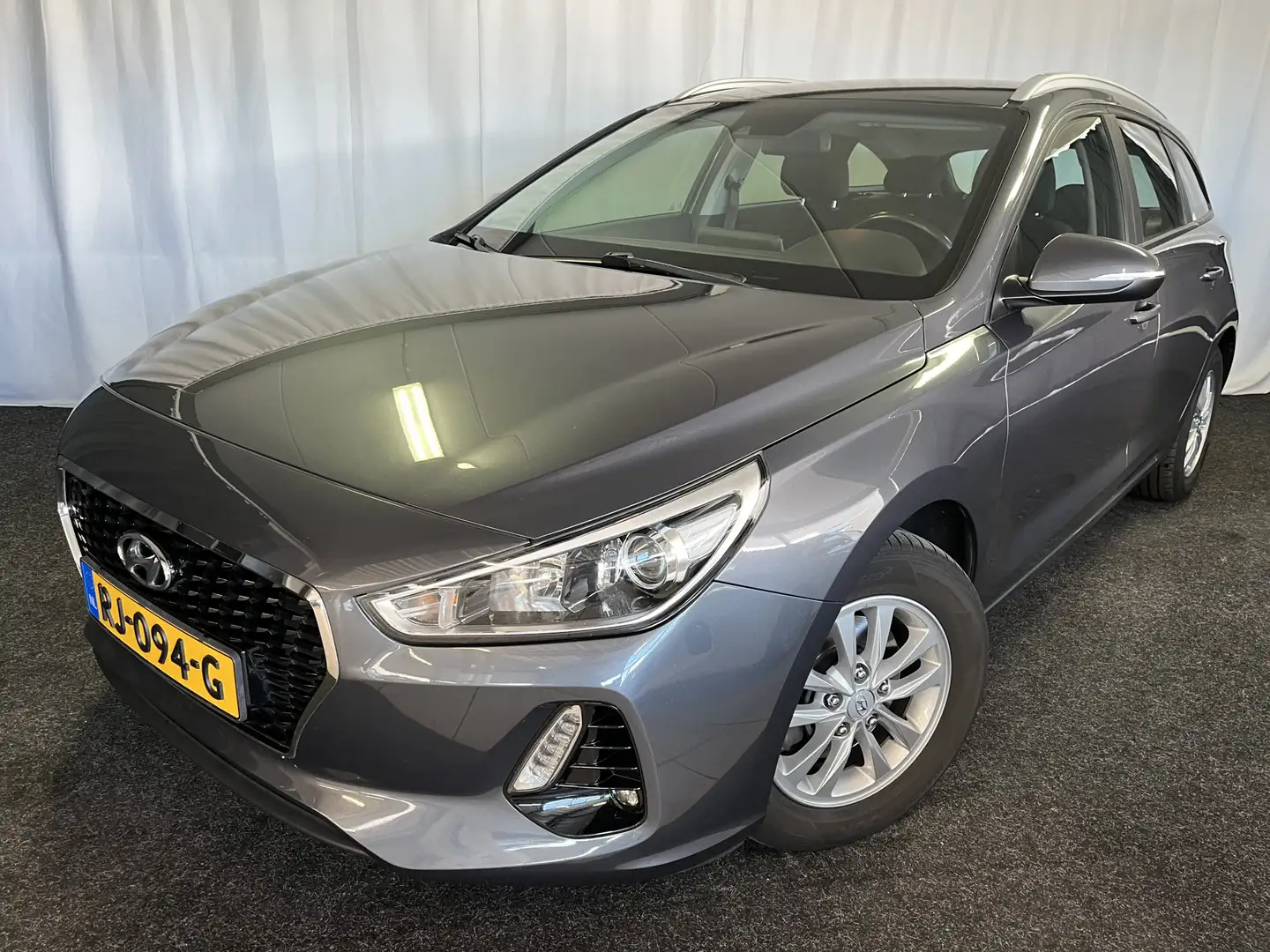 Hyundai i30 Wagon 1.0 T-GDI Comfort ECC/APPLE/CAMERA/CRUISE/NA Gris - 1