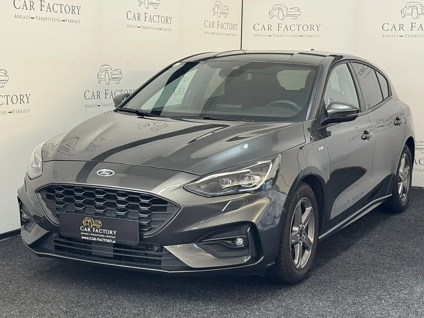 Ford Focus 1,0 EcoBoost ST-Line Business Grijs - 1