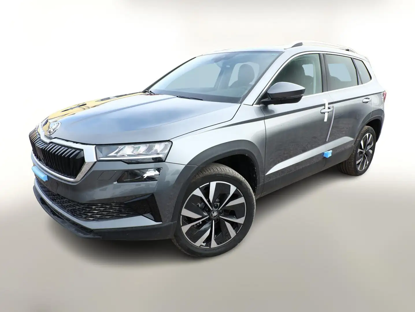 Skoda Karoq Selection TSI 150 DSG Pano AHK NavC SideA Leder... Gris - 1