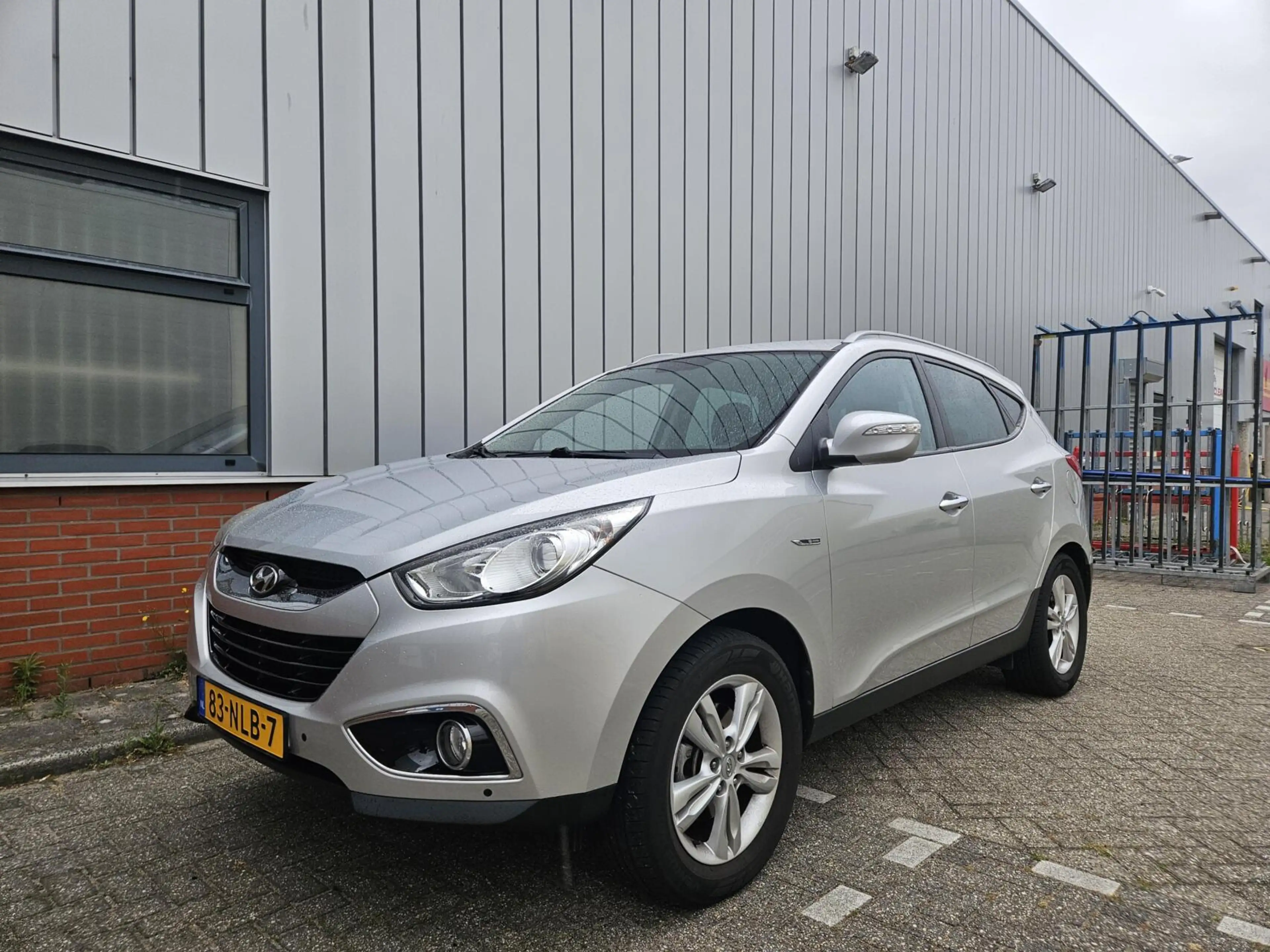 Hyundai iX35 2.0i NAP Cruise PDC Clima — photo 17
