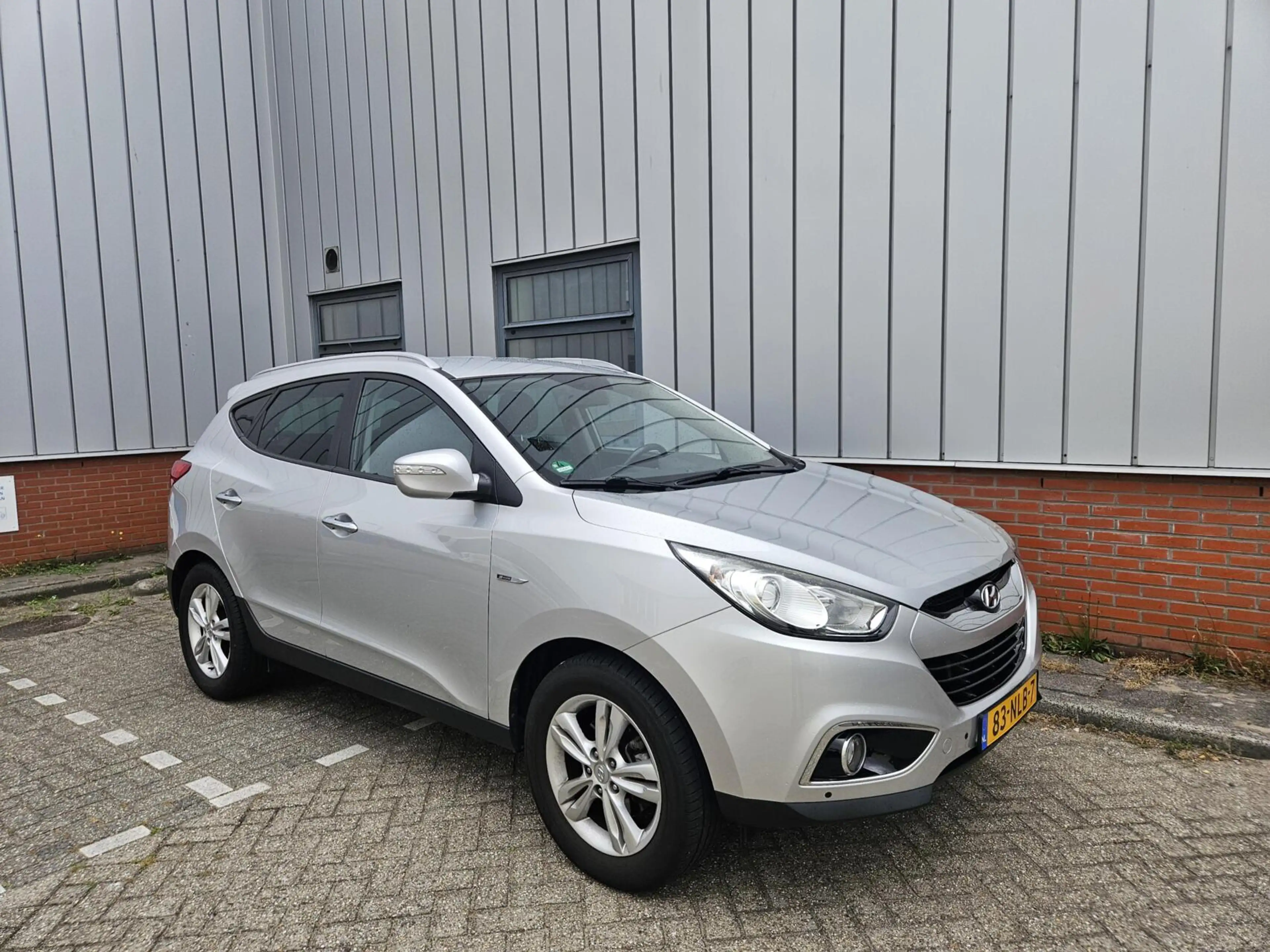 Hyundai iX35 2.0i NAP Cruise PDC Clima — photo 4