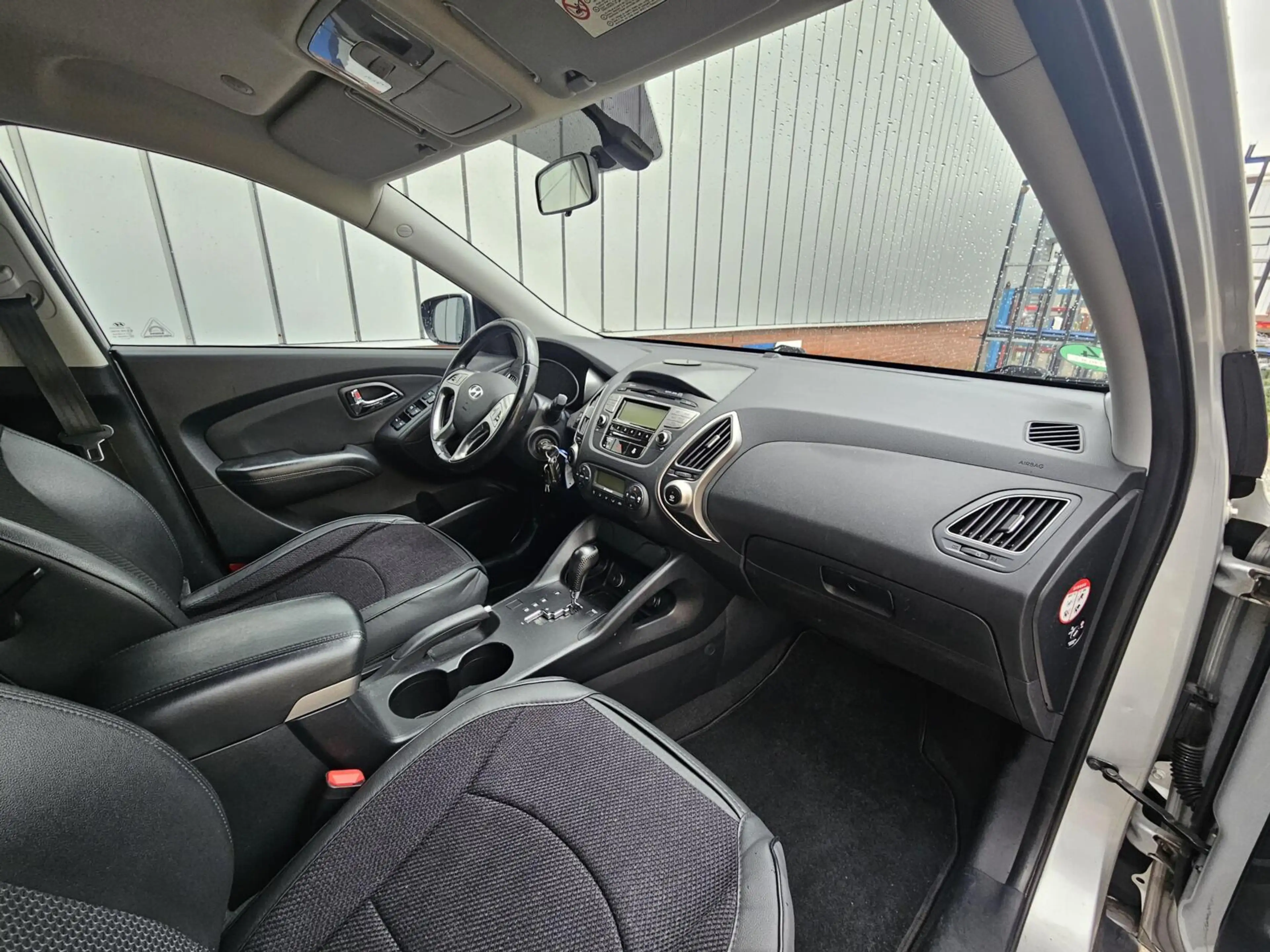 Hyundai iX35 2.0i NAP Cruise PDC Clima — photo 12