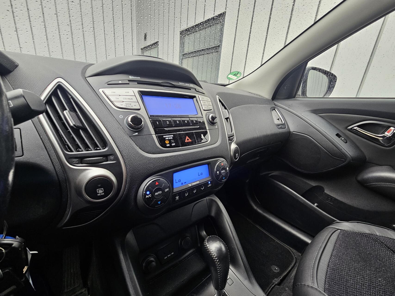 Hyundai iX35 2.0i NAP Cruise PDC Clima — photo 21