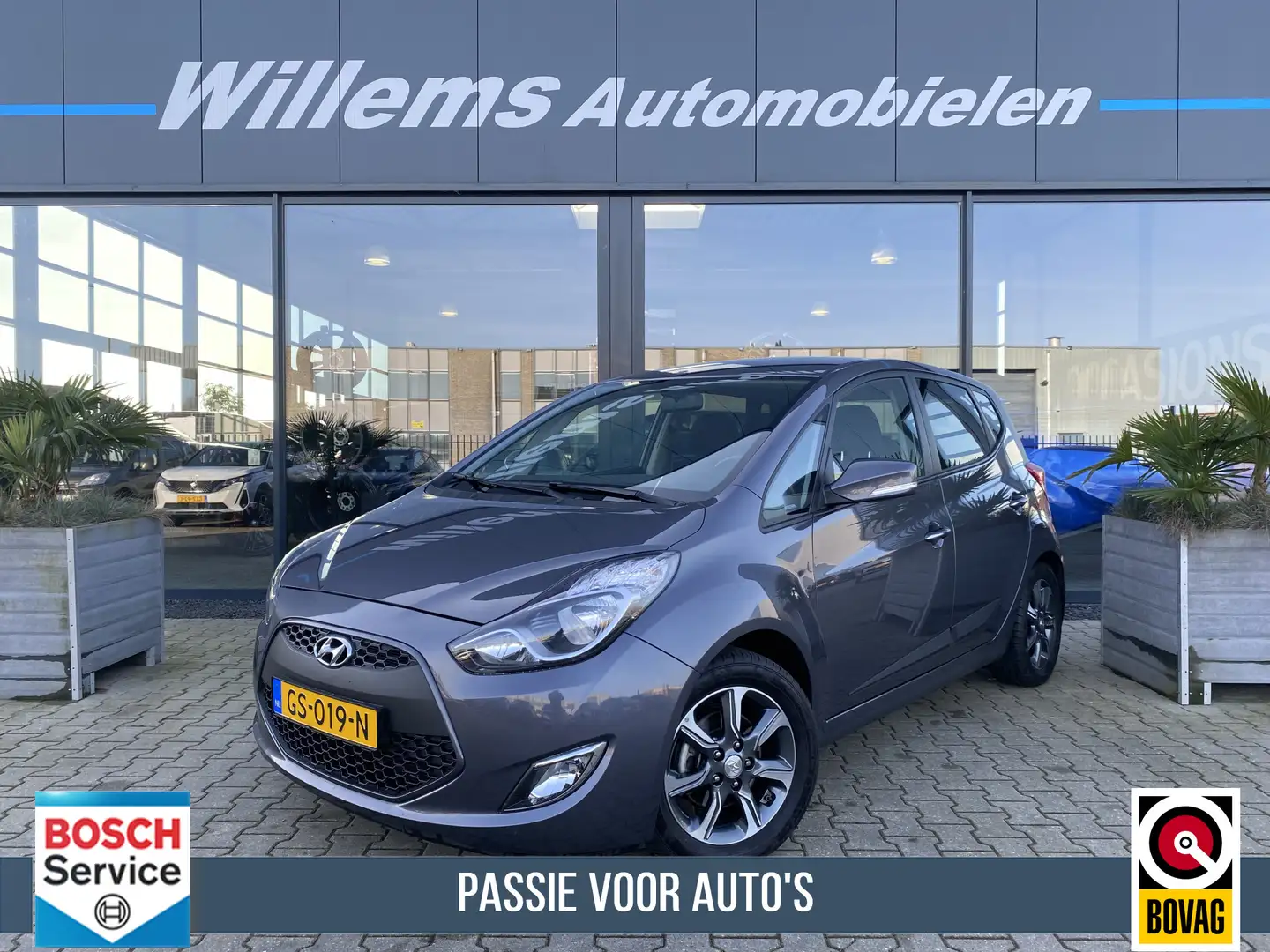 Hyundai iX20 1.6i Go! Navigatie, Camera & Trekhaak Gris - 1
