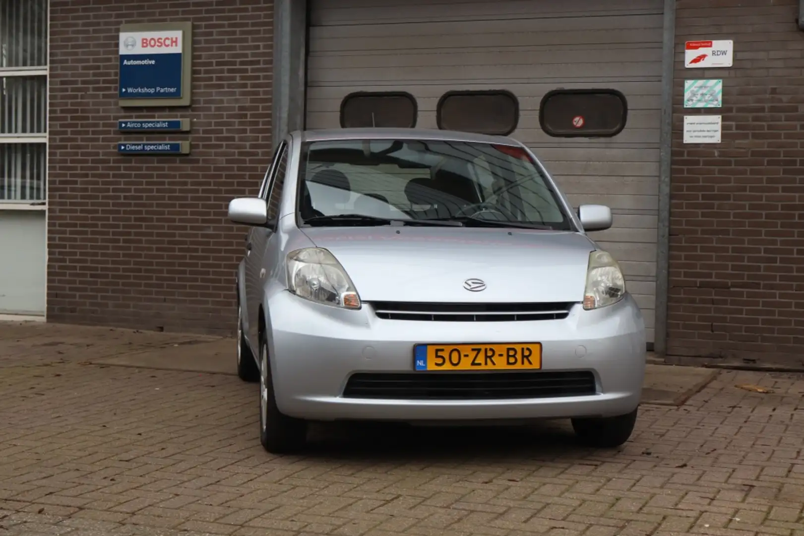 Daihatsu Sirion 2 1.3-16V Comfort Grau - 1