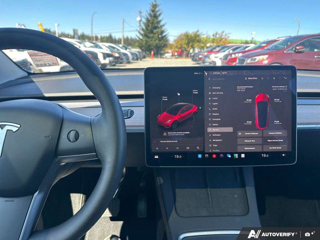 used 2025 Tesla Model Y car, priced at $56,888