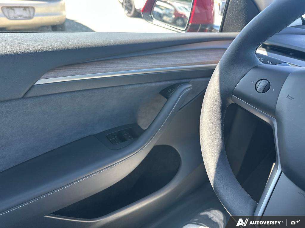 used 2025 Tesla Model Y car, priced at $56,888
