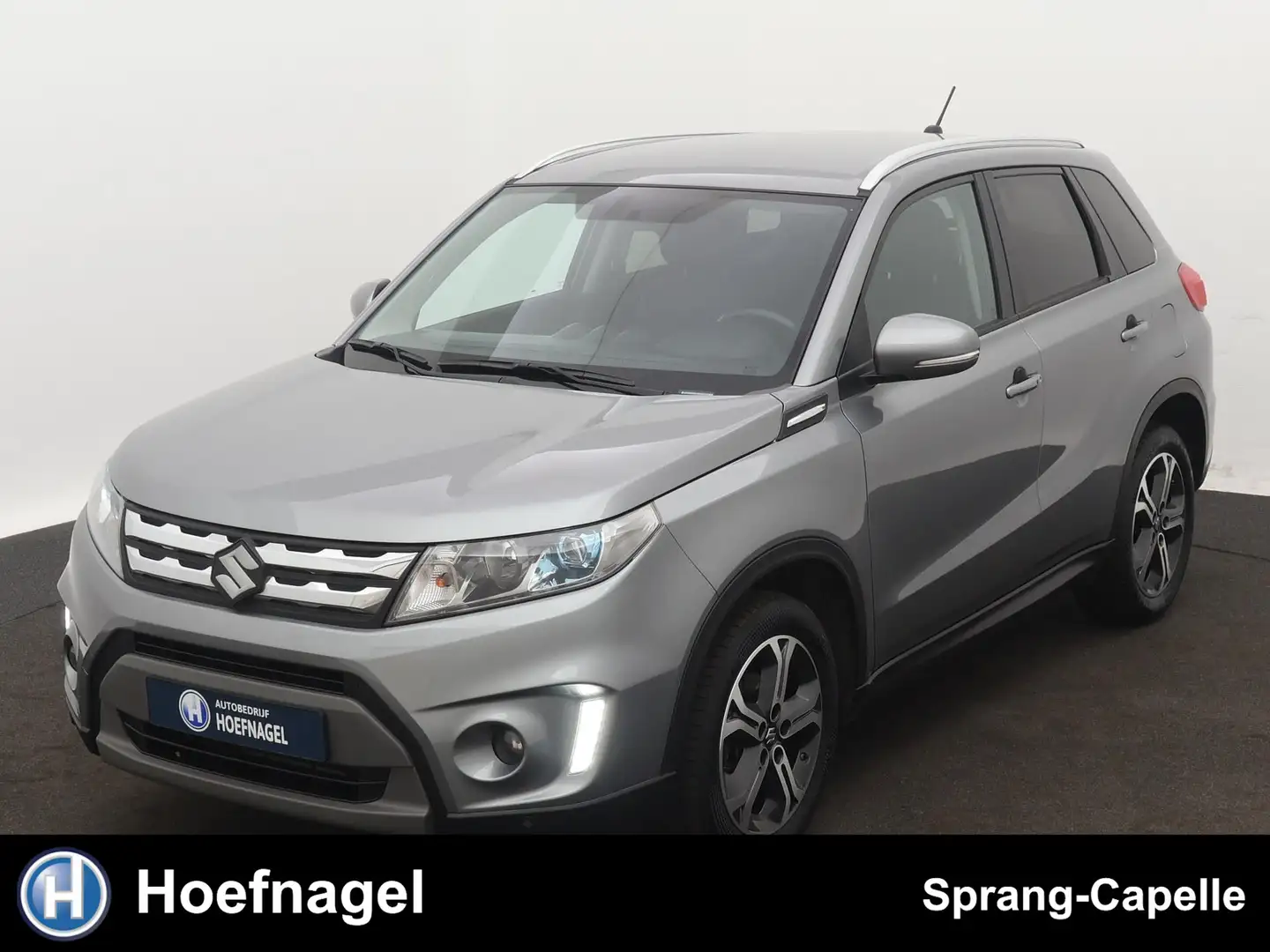 Suzuki Vitara 1.6 Exclusive | Camera | Adaptive Cruise | CarPlay Grijs - 1