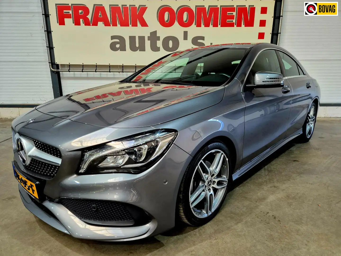 Mercedes-Benz CLA 180 120PK + Dealer OH|AMG styling|LED|Navi|Cruise|PDC| Grijs - 1
