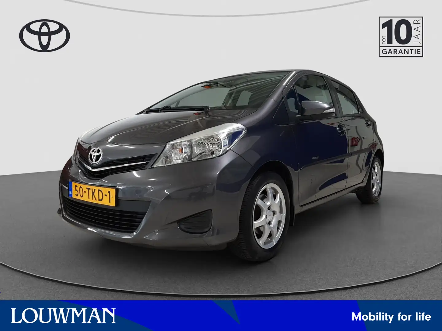 Toyota Yaris 1.3 VVT-i Aspiration | Navigatie | Camera | LM Vel Gris - 1