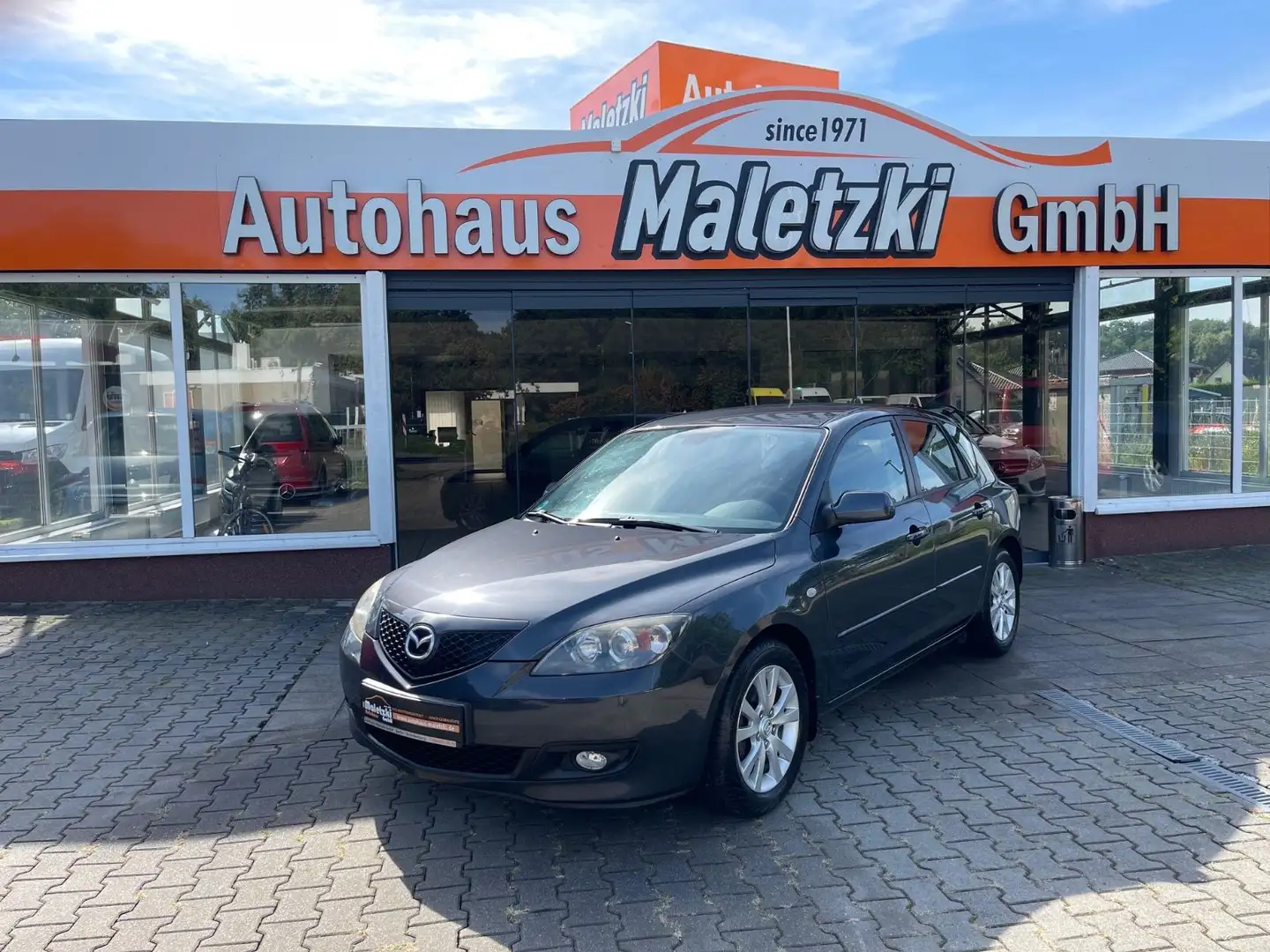 Mazda 3 1.6 Sport Active*Klima*El.Fenster*Radio/CD* Grau - 1