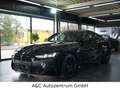 BMW M4 Coupé M xDrive Competition Noir - thumbnail 1