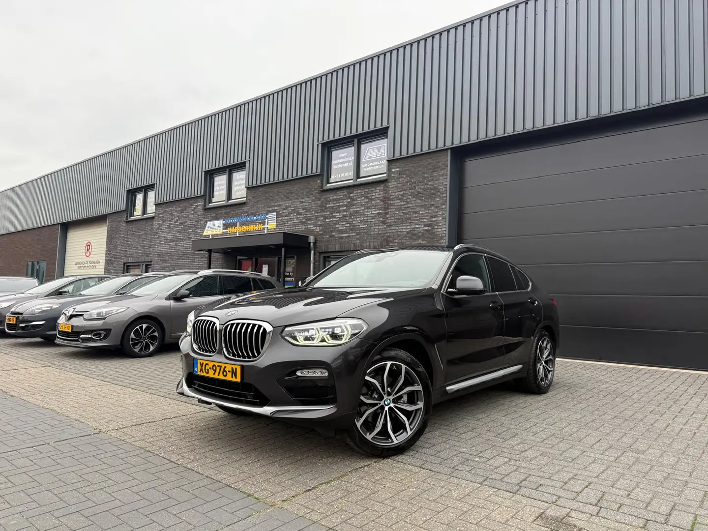 BMW X4 xDrive20i High Executive | 1E EIGENAAR | 12MND GAR Gris - 1