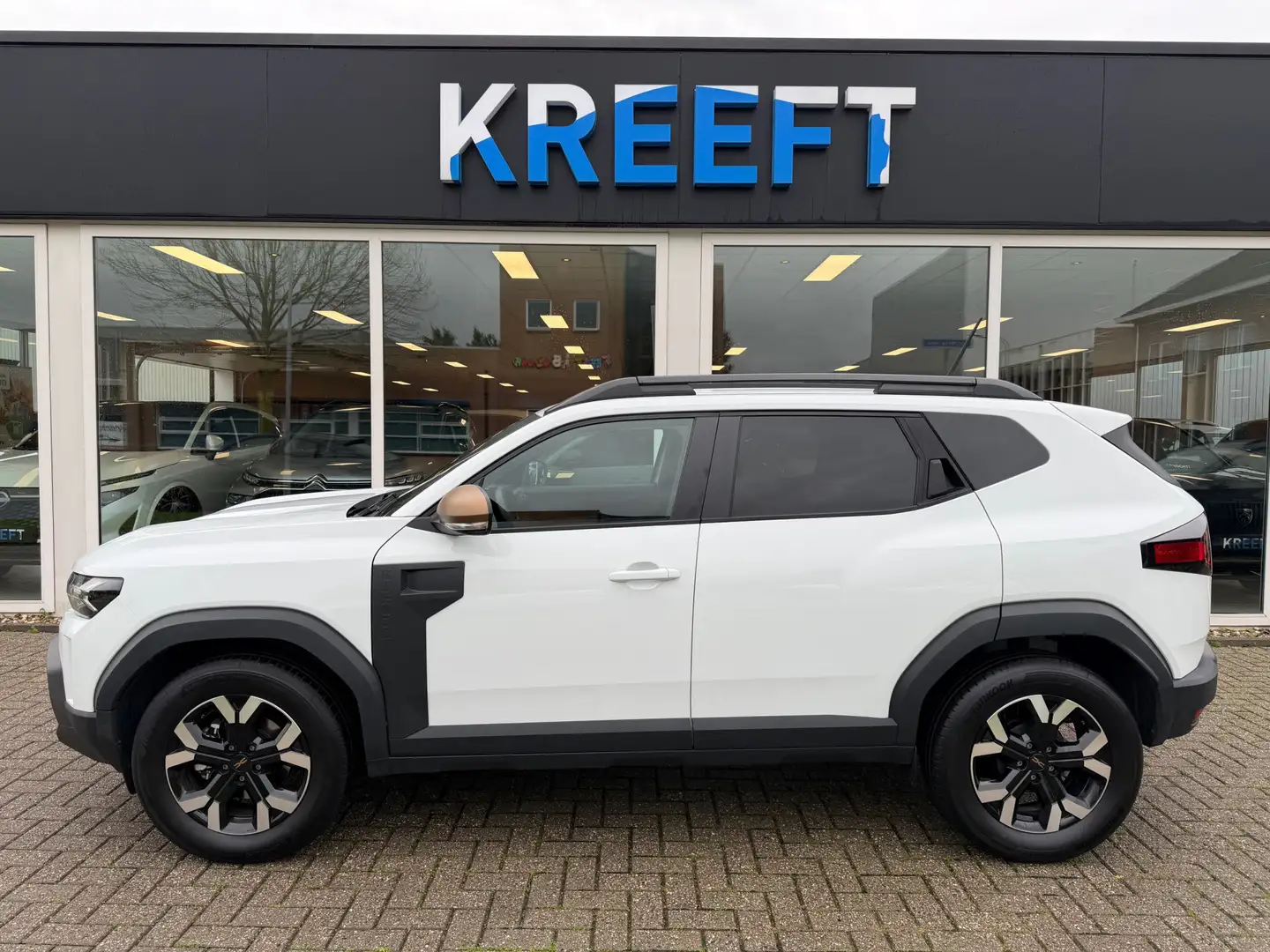 Dacia Duster 1.6 Hybrid 140 Extreme App connect | NIEUW Wit - 2