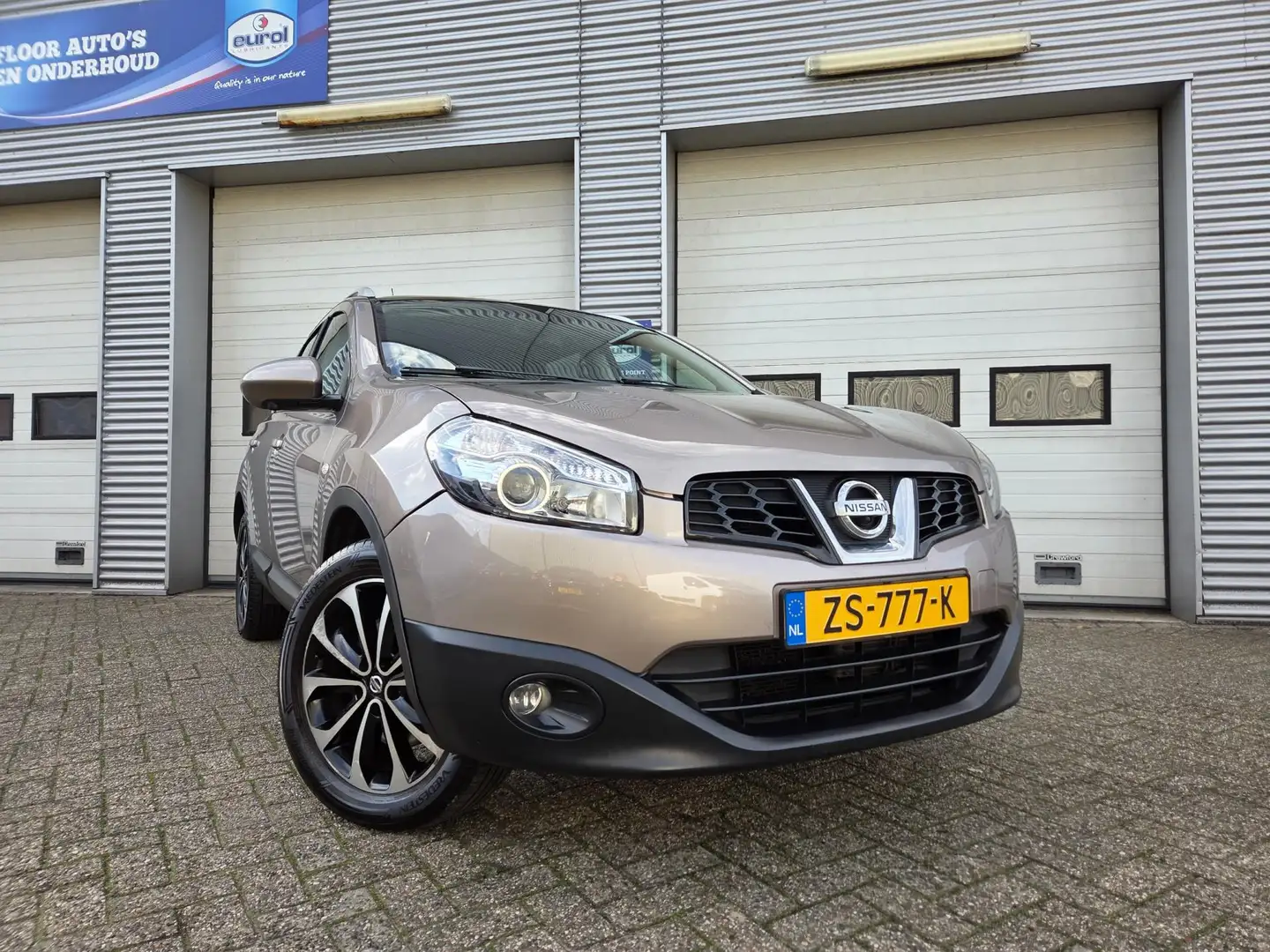 Nissan Qashqai+2 2.0 Connect 4WD |PANO|AUTOMAAT| Bruin - 2