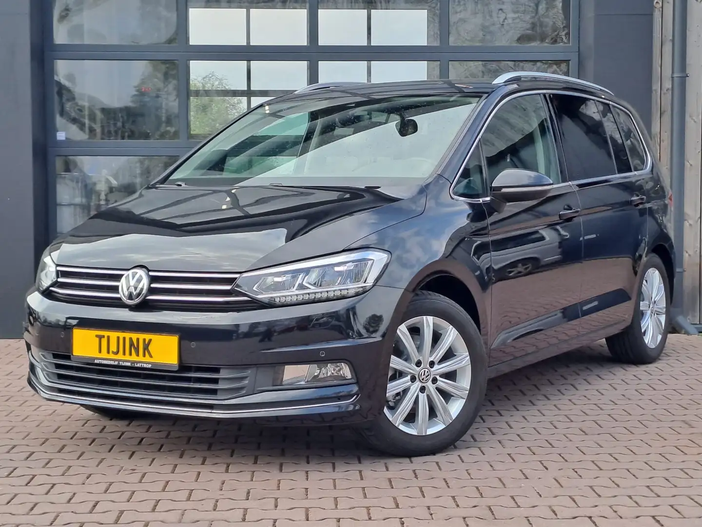 Volkswagen Touran 1.4 TSI Highline | Automaat | Navi | Trekhaak | St Zwart - 1