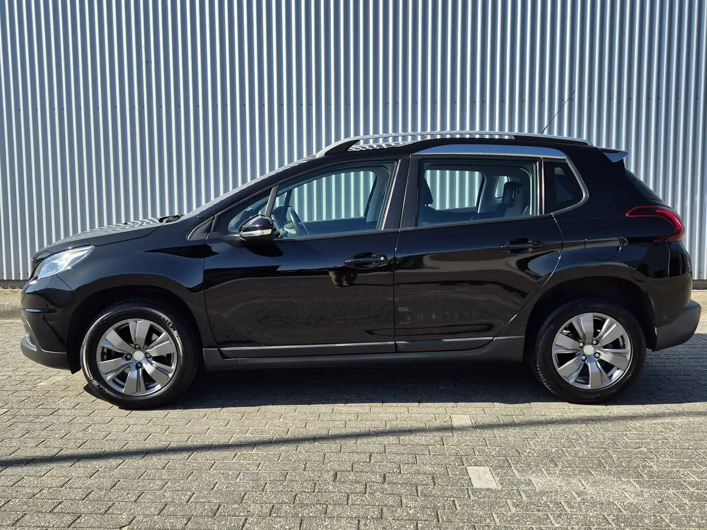 Peugeot 2008 1.2 110PK PureTech | Blue Lion | Panoramadak | Par Schwarz - 2