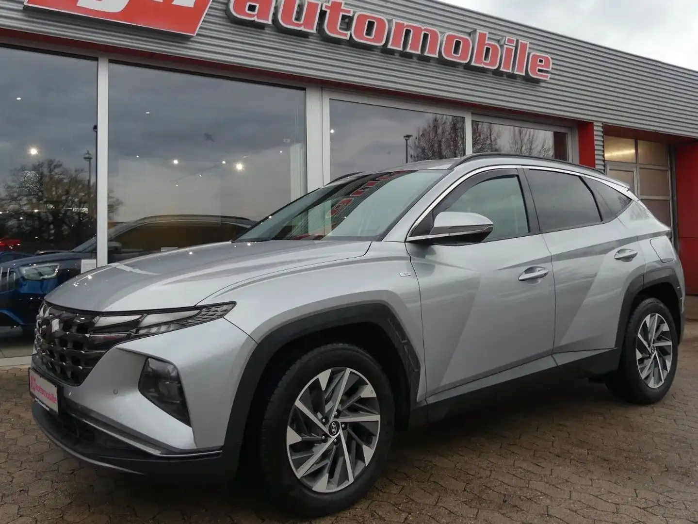 Hyundai TUCSON Select 2WD*Navi*Kamera*1. Hand*MwSt Grau - 1