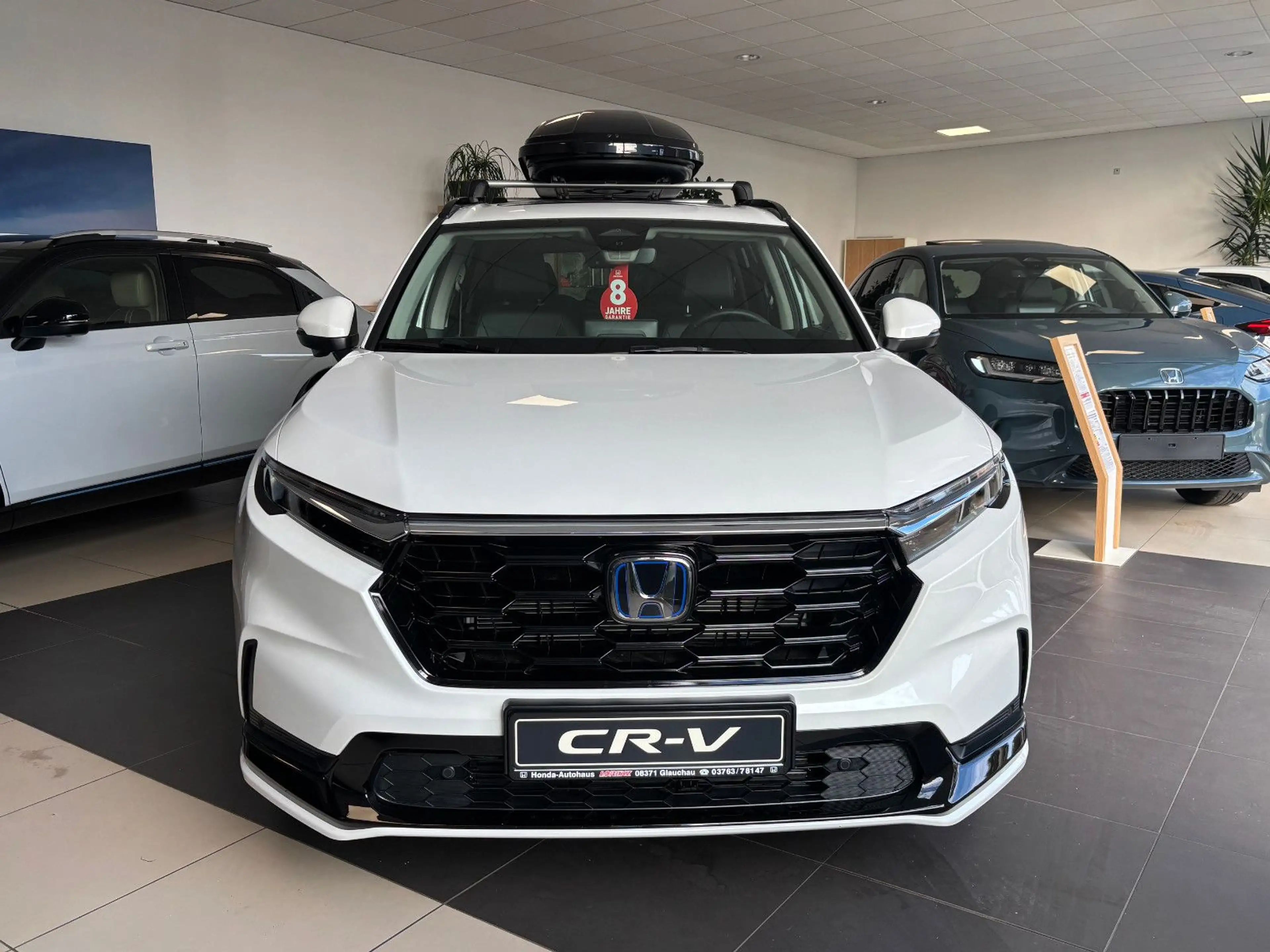 Honda CR-V 2.0 eHEV Elegance Style 20 Zoll+Winterräder — photo 2