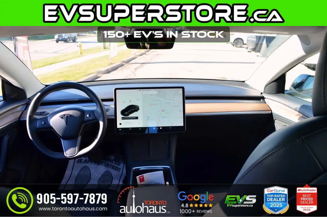 Tesla Model 3 photo Tesla Model 3
