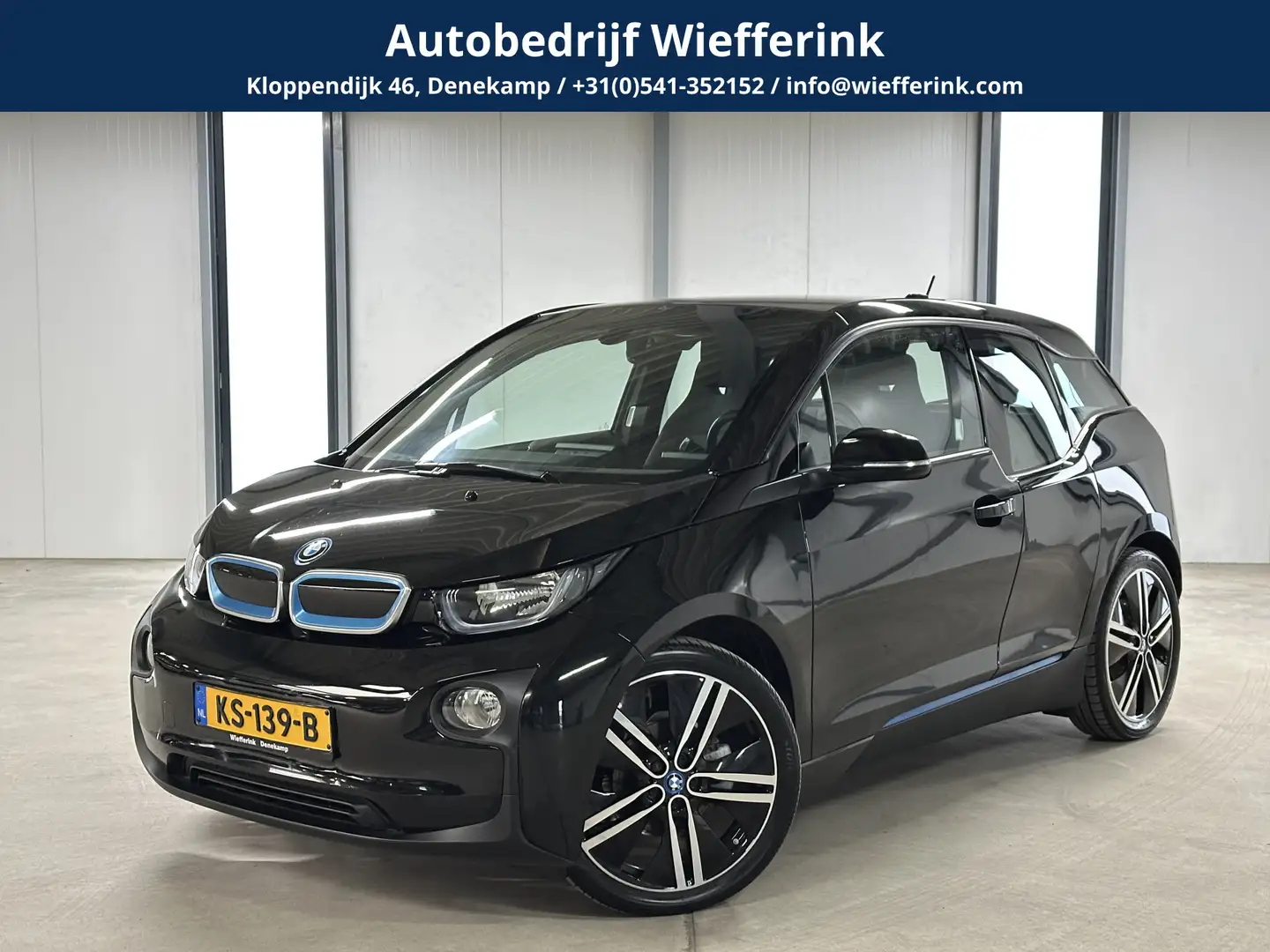 BMW i3 Basis 22 kWh 170pk | Stoelverwarming | 20" | Noir - 1