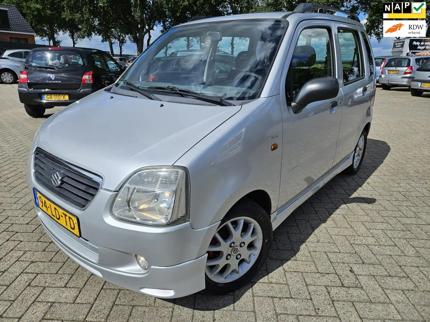 Suzuki Wagon R+ 1.3 Special 2002. Mistlampen/Lichtmetaal/Spoiler e Grau - 1