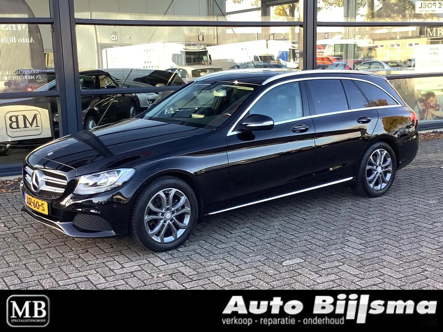 Mercedes-Benz C 180 Estate Prestige, navi, cruise, parkeersensoren, st Zwart - 1