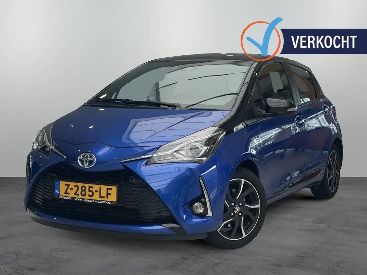 Toyota Yaris 1.5 Hybride Bi-Tone Plus [CLIMA I CRUISE I NAVIGAT Blauw - 1