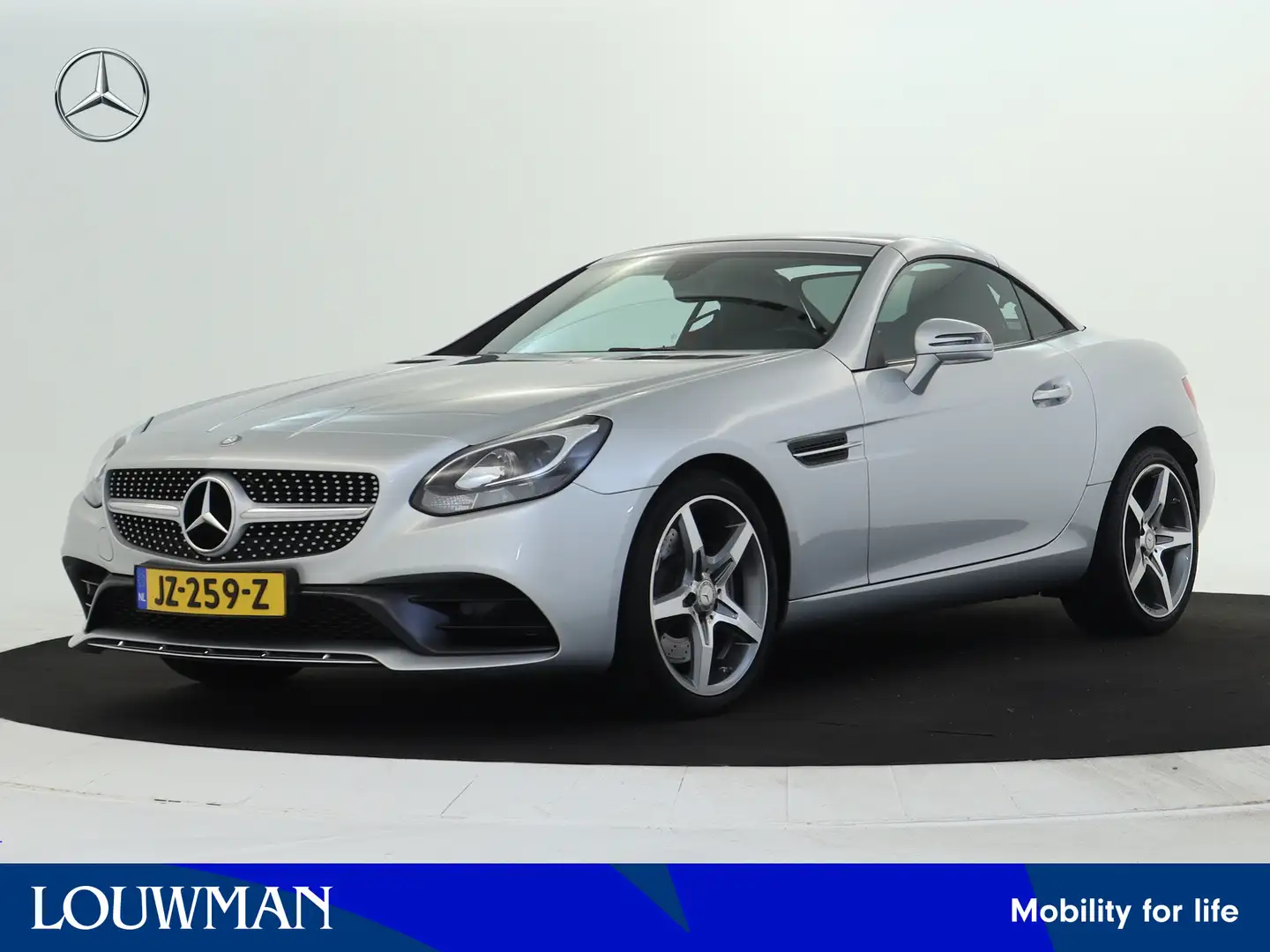 Mercedes-Benz SLC 180 AMG Sportpakket | Airscarf | Leder | Parkeercamera Gris - 1