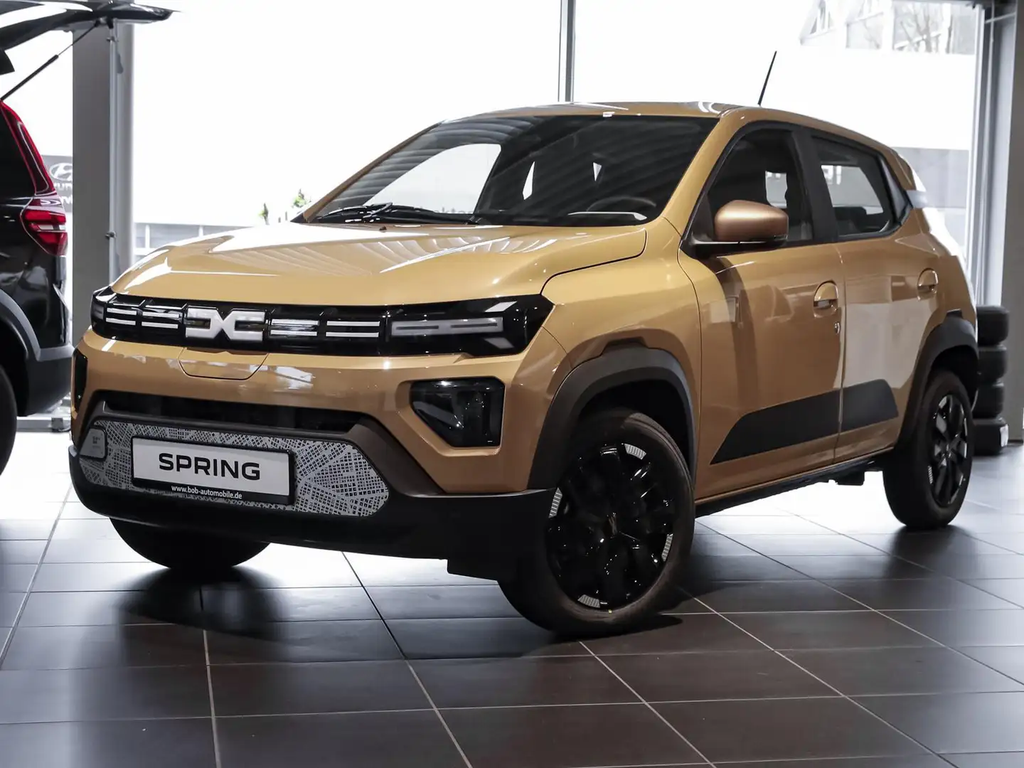 Dacia Spring FL24 Extreme ELECTRIC 65 CCS Schuko PDC Beige - 1
