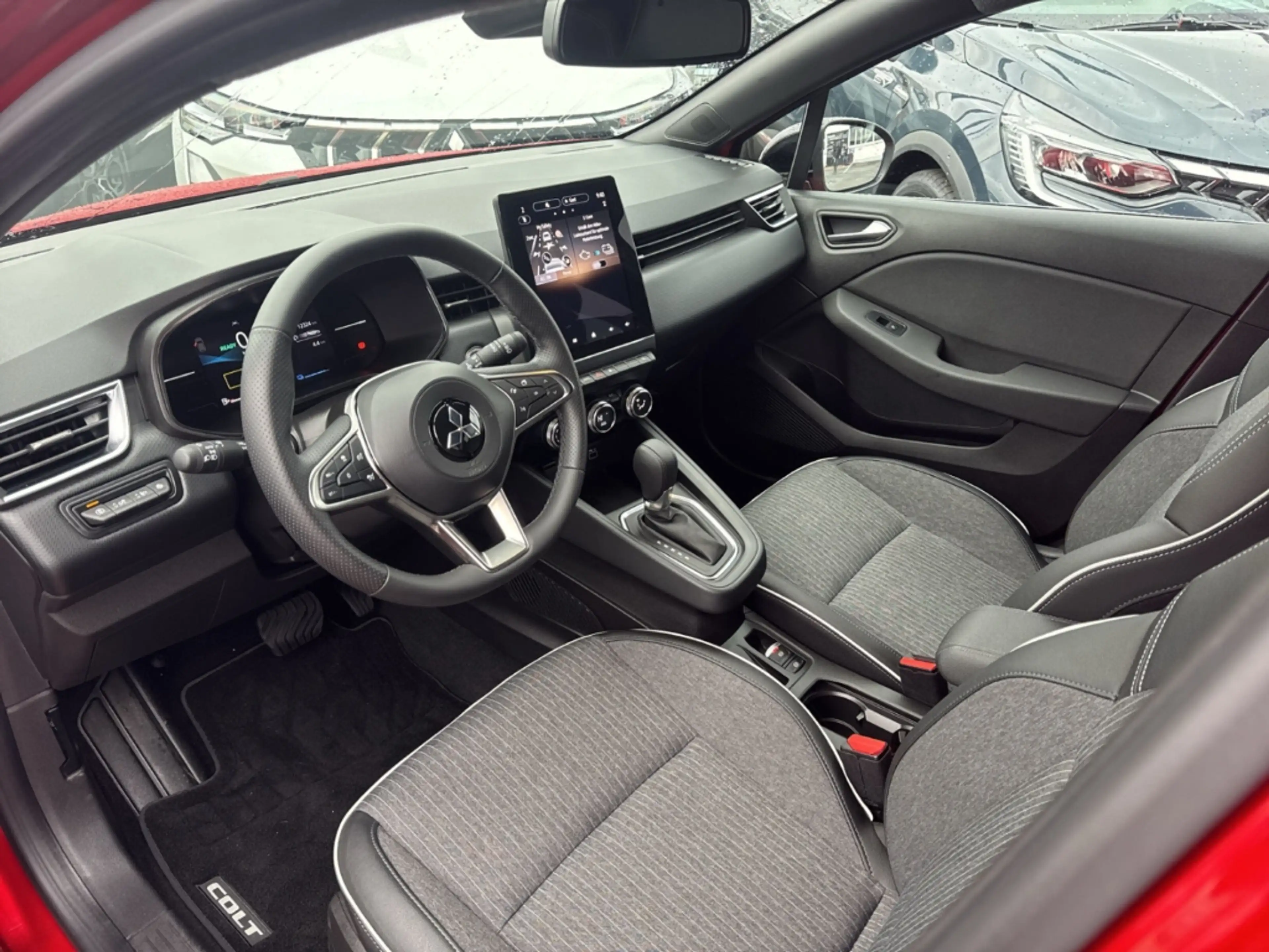 Mitsubishi Colt Select HEV Kamera PDC App Navi Teilleder — photo 7