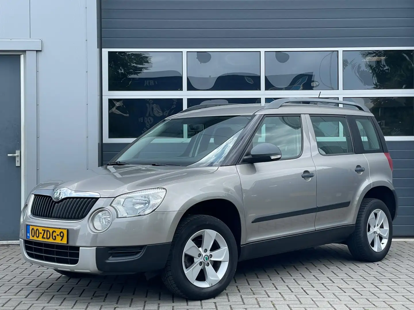Skoda Yeti 1.2 TSI Comfort | Navi | Hoge zit | Airco | Elektr Beige - 1