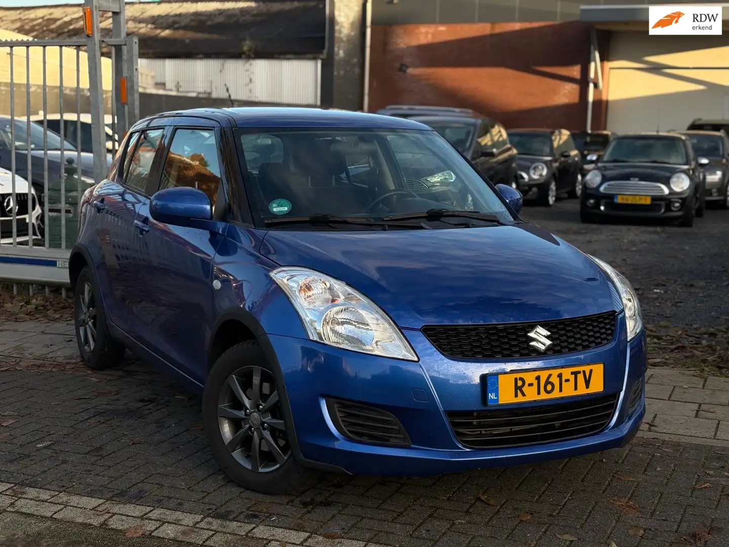 Suzuki Swift 1.2 Dynamic Allgrip 4X4 | 15” LMV | Airco | Stoelv Bleu - 1