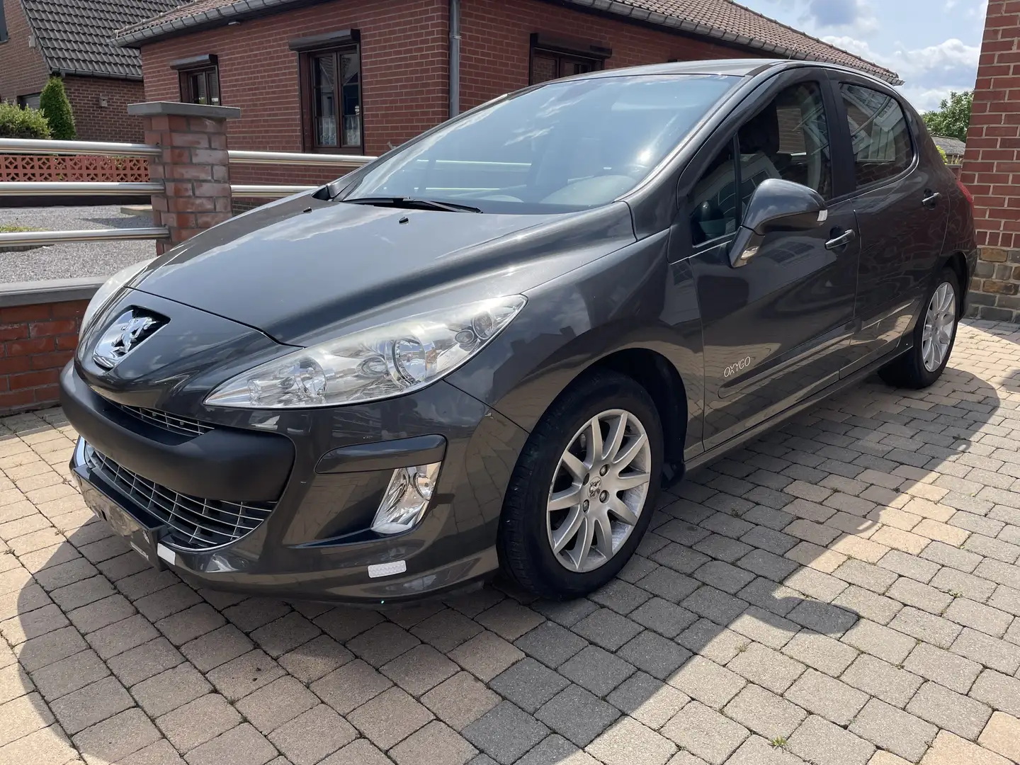 Peugeot 308 1.6 HDi Oxygo Euro5/1er prop/carnet d’entretien - 1