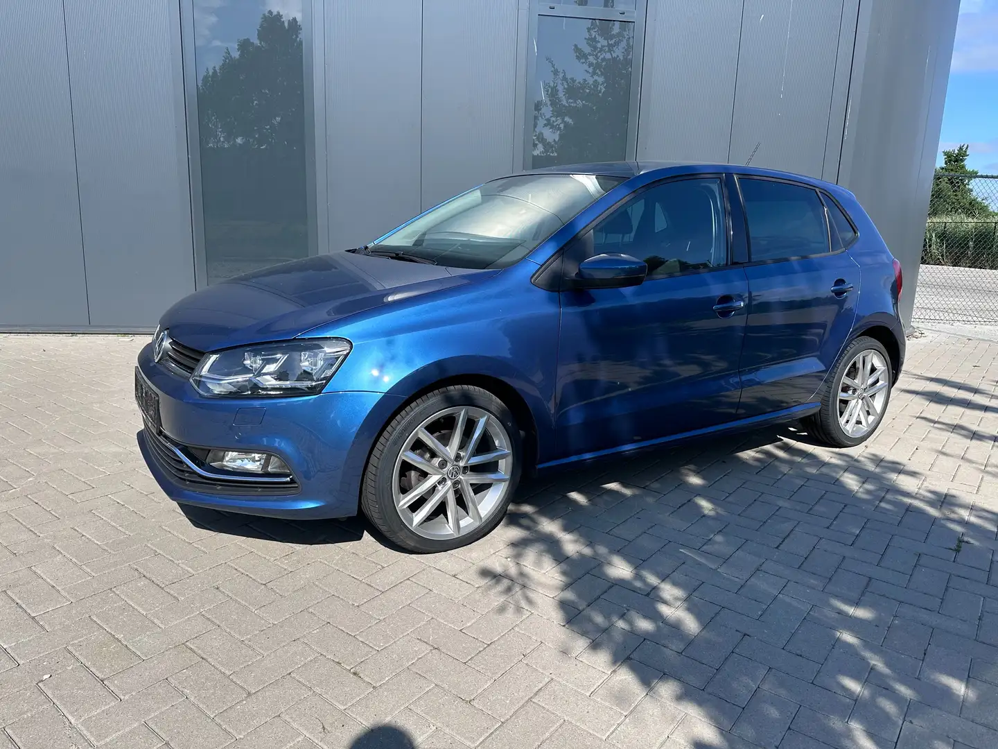 Volkswagen Polo 1.2 TSI Highline 5-drs Blauw - 1