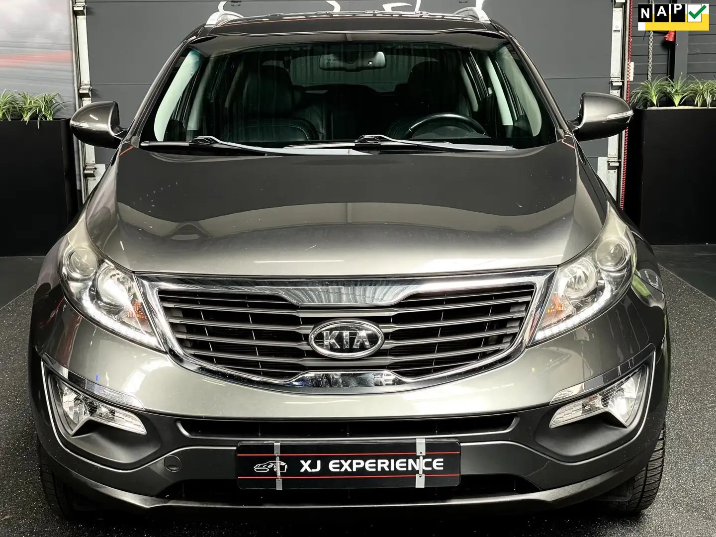 Kia Sportage 1.6 GDI X-ecutive Plus Pack Grijs - 1