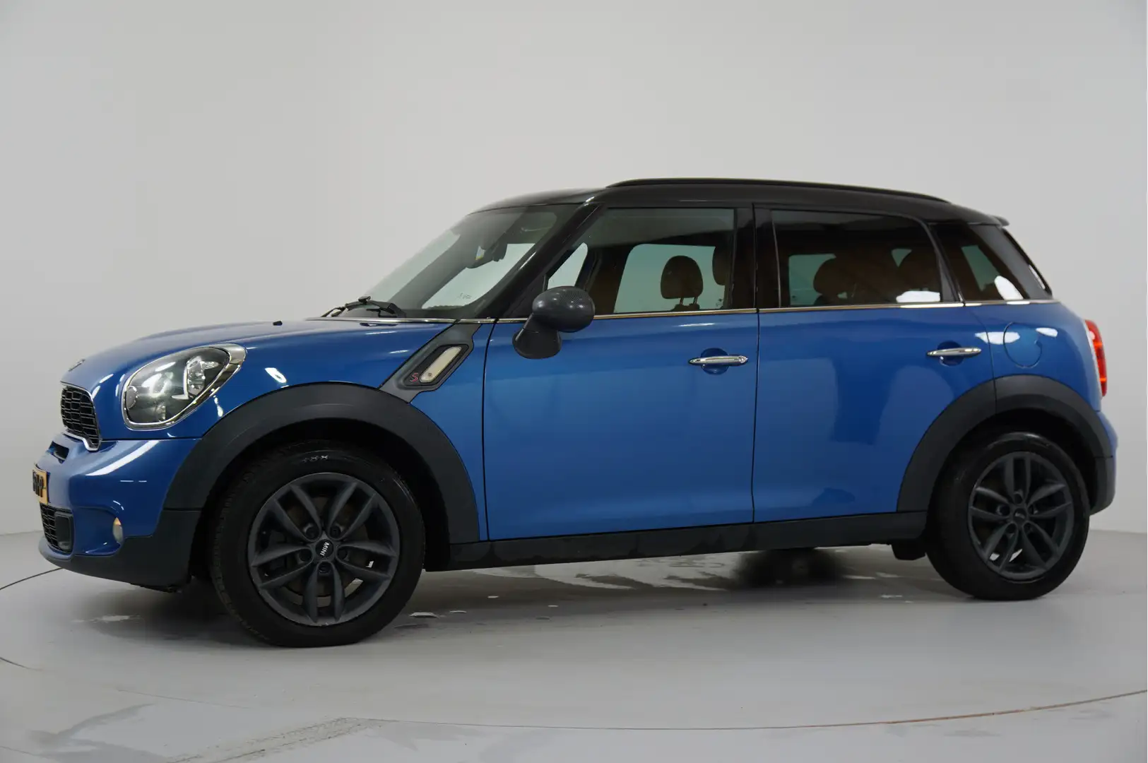 MINI Cooper S Countryman 1.6 | Bi-Xenon | Navi | Stl. verw. | Clima | PDC | Blauw - 2