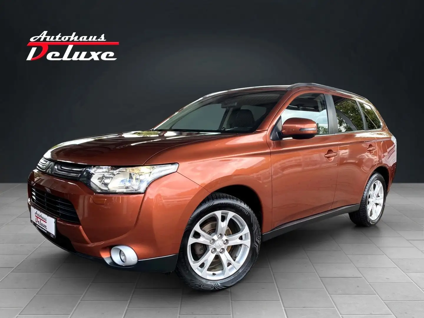 Mitsubishi Outlander 2,2 DI-D 4WD NAVI-KAMERA-AHK-7-SITZER Orange - 1